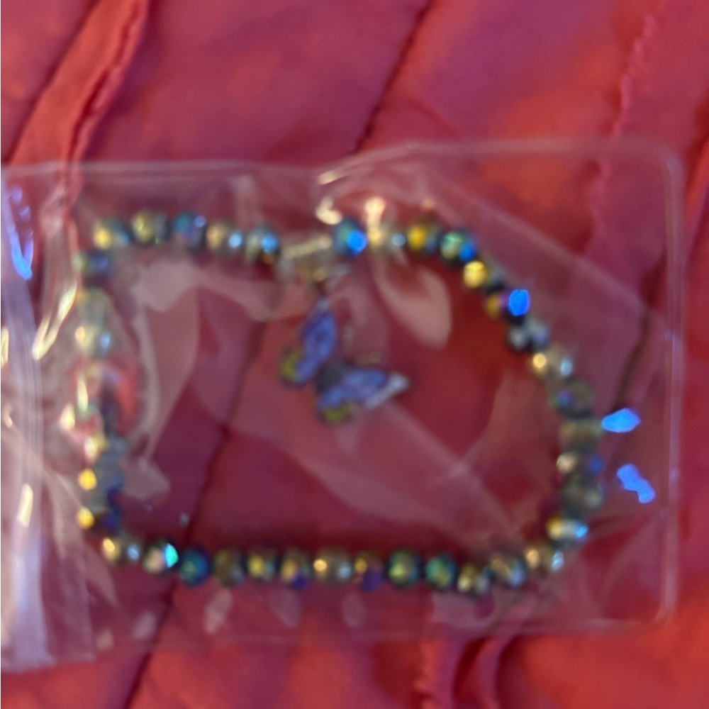 Iridescent Beaded Bracelet with Butterfly Charm